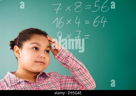 Girl Thinking in classroom, Baden-Wurttemberg, Germany Banque D'Images