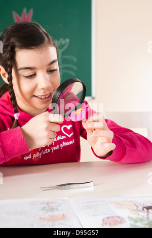 Portrait of Girl Flower in classroom, Baden-Wurttemberg, Germany Banque D'Images