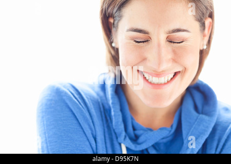 Head and shoulders Portrait of Woman wearing Hoodie in Studio Banque D'Images