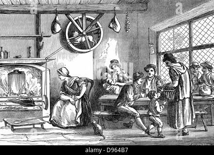 Turnspit chien à travailler à l'auberge à Newcastle, Carmarthen, c1800. Ces courtes pattes chiens ont été produites en particulier de travailler en cuisine roues tournant crache. En 1800, la race a presque disparu. La gravure sur bois de 1869. Banque D'Images