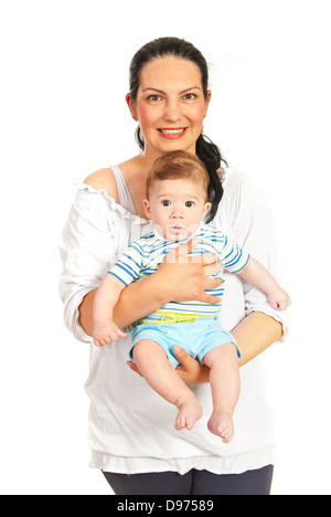 Cheerful maman embrassant son bébé isolé sur fond blanc Banque D'Images