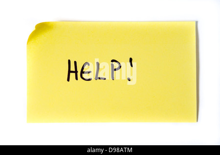 Aide ! Écrit en lettres majuscules sur un post-it jaune Banque D'Images