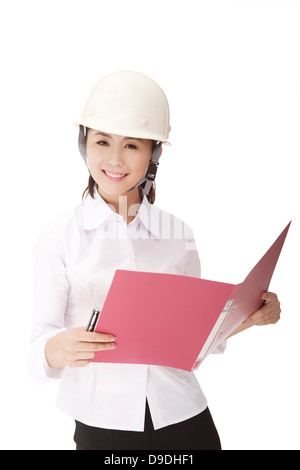 Femme d'affaires portant un casque de sécurité Banque D'Images