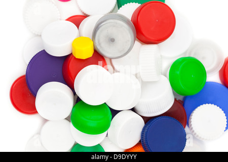 Bouchons en plastique colorés en blanc isolé Banque D'Images