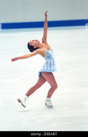 Michelle Kwan (USA) qui se font concurrence dans le style libre au Jeux Olympiques d'hiver de 1998, Nagano, Japon. Banque D'Images