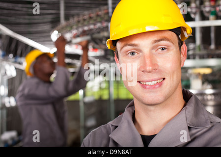 Travailleur industriel closeup portrait en usine Banque D'Images