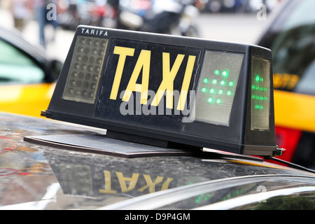 Signe de taxi, Barcelone, Espagne Banque D'Images