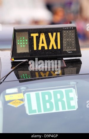 Signe de taxi, Barcelone, Espagne Banque D'Images