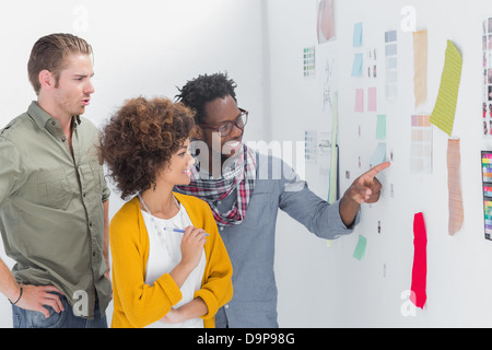 Smiling designers working together Banque D'Images