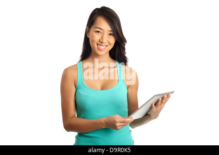 Beautiful Asian woman smiling and holding digital tablet Banque D'Images