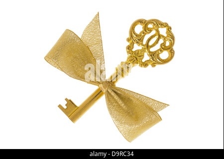 Or antique key isolated Banque D'Images