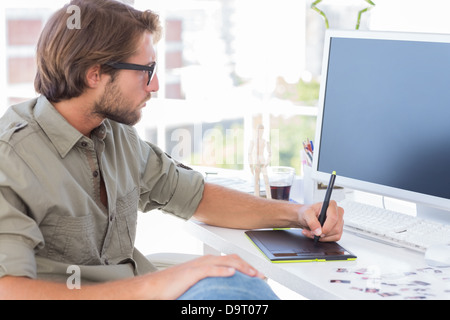 Artiste à l'aide de tablettes graphiques Banque D'Images