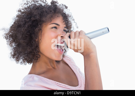 Attractive Woman singing microphone intégré Banque D'Images