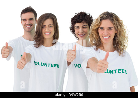 Groupe de volontaires giving Thumbs up Banque D'Images