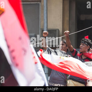 Le Caire, Égypte. 30 juin 2013 la place Tahrir, Le Caire, Égypte. Les manifestants se rassemblent pour protester contre l'état de Président Morsi et ses partisans des Frères musulmans, un an après sa victoire électorale. Banque D'Images