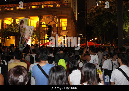 Hong Kong. 1er juillet 2013. Recueillir des marcheurs pro-démocratie à Central, Hong Kong. Crédit : Robert SC Kemp/Alamy Live News Banque D'Images