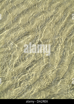 Motifs abstraits, aléatoire créé par la marée sur le sable de la plage de Worthing, West Sussex, UK Banque D'Images