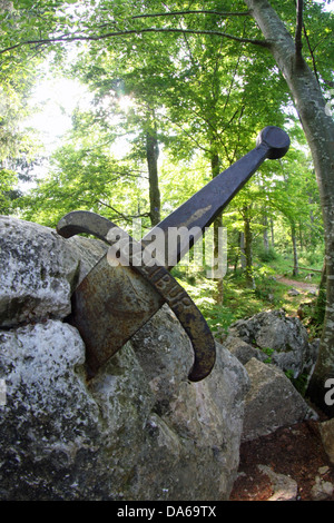 Légendaire et célèbre épée Excalibur au Roi coincé entre la roche Banque D'Images