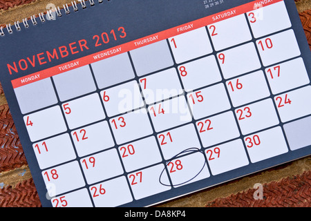 Calendrier mensuel accrochées sur un mur avec le jeudi 28 novembre - Cercle de grâce aux Etats-Unis, 2013 Banque D'Images