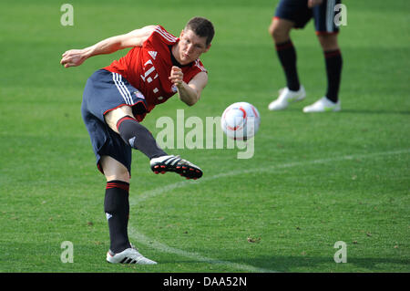 Bastian Schweinsteiger de Munich au cours de la formation du club camp à Doha, Qatar, 06 janvier 2011. Photo : Andreas Gebert Banque D'Images