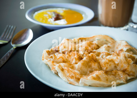 Roti canai, un malaise d'aliments populaires trouvés dans les restaurants musulmans indiens. Banque D'Images