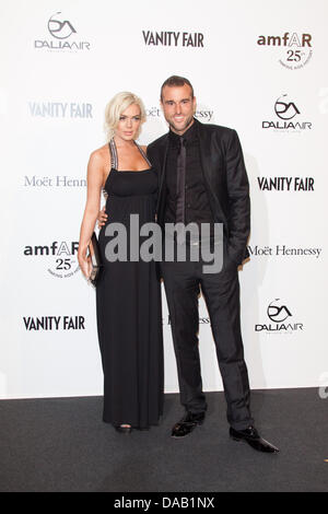 L'actrice Lindsay Lohan et designer allemand Philipp Plein de participer au Gala amfAR 2011 Milano, vente aux enchères et le dîner à la Permanente à Milan, Italie, le 23 septembre, 2011. Photo : Hubert Boesl Banque D'Images