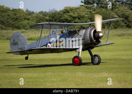 Royal Air Force Fighter Biplane Gloster Gladiator G-AMRK K7985 au cours d'un taxi au Old Warden Shuttleworth Military Pageant Airshow Banque D'Images