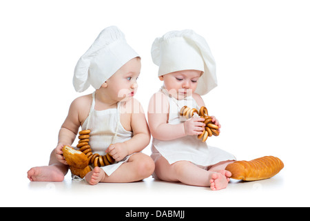 Funny cuisiniers bébé garçon et fille Banque D'Images