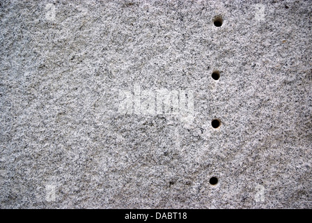 Trou rond sur le granit.La surface de pierre de granit noir et blanc. Pour texture background Banque D'Images