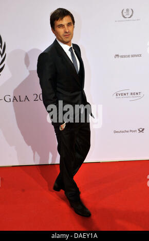 L'acteur français Olivier Martinez arrive au Gala de Charité de l'Unesco 2011 à Duesseldorf, Allemagne, 19 novembre 2011. Des célébrités et des personnalités du show-business, la politique, l'économie et des sports se sont réunis pour collecter des dons pour les enfants défavorisés du monde entier. Photo : Henning Kaiser Banque D'Images