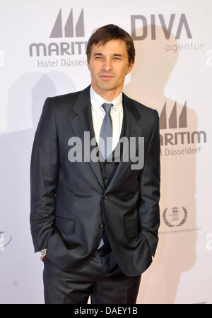 L'acteur français Olivier Martinez arrive au Gala de Charité de l'Unesco 2011 à Duesseldorf, Allemagne, 19 novembre 2011. Des célébrités et des personnalités du show-business, la politique, l'économie et des sports se sont réunis pour collecter des dons pour les enfants défavorisés du monde entier. Photo : Henning Kaiser Banque D'Images