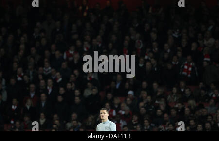 Gardien d'Arsenal Wojciech Szczesny réagit au cours de la Ligue des Champions Groupe F match Arsenal Londres vs Borussia Dortmund à Arsenal Stadium à Londres, Grande-Bretagne, le 23 novembre 2011. Photo : Friso Gentsch dpa Banque D'Images