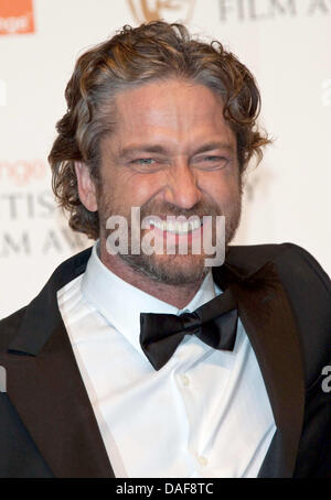 L'acteur écossais Gerard Butler pose dans la salle de presse du gagnant de la British Academy Film Awards BAFTA au Royal Opera House de Londres, Grande-Bretagne, 13 février 2011. Photo : Hubert Boesl Banque D'Images