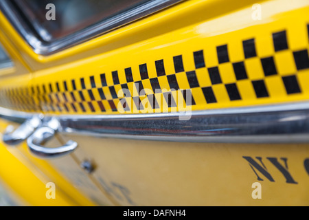 Close up contexte photographie du côté de New York City Taxi jaune Banque D'Images