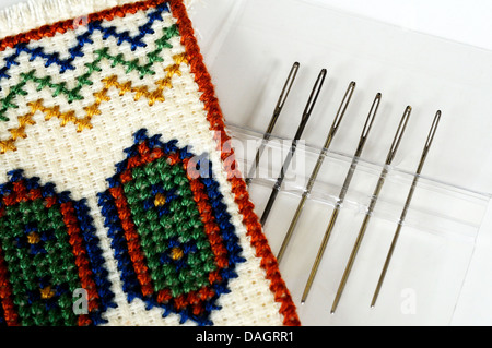 Tapestry/aiguilles broderie tapisserie brodée dans un cas. Banque D'Images