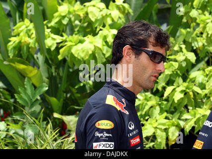 Pilote de Formule Un Australien Mark Webber de Red Bull vu à l'extérieur du circuit Sepang, Kuala Lumpur, Malaisie, 07 avril 2011. Le Grand Prix de Formule 1 de Malaisie aura lieu le 10 avril 2011. Photo : Jens Buettner dpa Banque D'Images