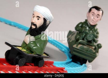 (ILLUSTRATION) Une illustration en date du 02 mai 2011 présente le terroriste Oussama ben Laden et l'ancien président américain George W. Bush comme des chiffres sur un petit train voie. Les jouets sont en vente dans des pays arabes sous le nom de 'chemin d'Arc 911'. Oussama ben Laden a été tué par une opération des forces spéciales US ainsi que l'un de ses fils autour de 100 kilomètres au nord d'Islamabad, au Pakistan. Photo : Ma Banque D'Images