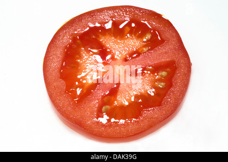 Jardin la tomate (Solanum lycopersicum, Lycopersicon esculentum), tranche de tomate Banque D'Images