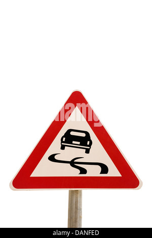 Panneau routier. Attention, route glissante Banque D'Images