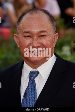 Le réalisateur John Woo arrive à la première de "Les ides de mars" au cours de la 68e Festival International du Film de Venise au Palazzo de Cinema à Venise, Italie, 31 août 2011. Photo : Hubert Boesl Banque D'Images