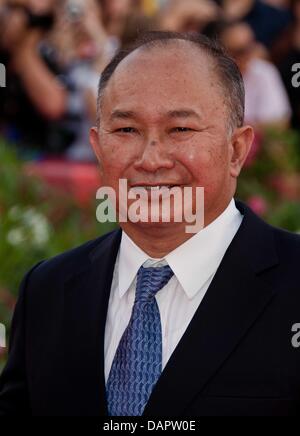 Le réalisateur John Woo arrive à la première de "Les ides de mars" au cours de la 68e Festival International du Film de Venise au Palazzo de Cinema à Venise, Italie, 31 août 2011. Photo : Hubert Boesl Banque D'Images