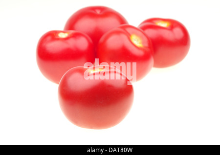 Tomate isolés devant d'autres personnes, on white Banque D'Images