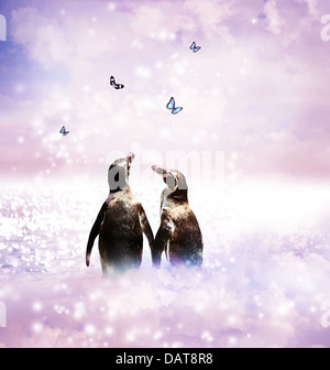 Deux pingouins tenant dans un fantasme ailes nature paysage avec papillons Banque D'Images
