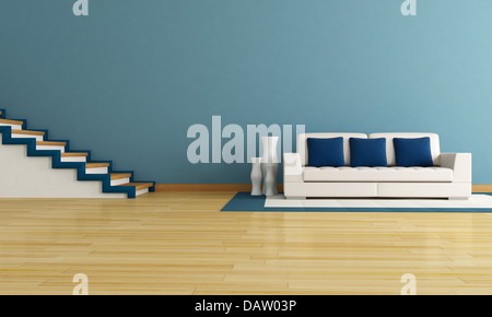 Salon bleu avec escalier et moderne de la table blanche Banque D'Images