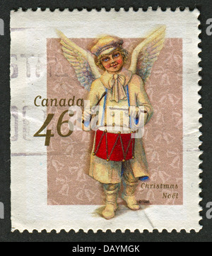 CANADA - VERS 1999 : timbre imprimé au Canada montre l'image de Noel Noël, vers 1999. Banque D'Images