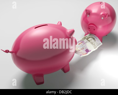 Au cours de l'argent montre Piggybanks lutter contre les décisions d'investissement Banque D'Images