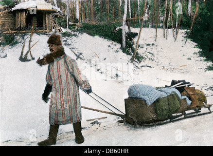 Dans le Klondike prospecteurs avec son matériel et le traîneau, 1898. Demi-teinte à la main, reproduction d'une photographie Banque D'Images