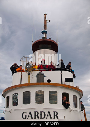 Ancienne whalership transformés pour l'observation des baleines. Baie de Husavik. L'Islande, la Scandinavie, l'Europe. Banque D'Images