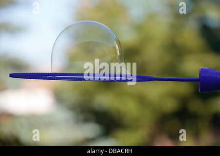 Bulle sur une bulle de l'enfant. Banque D'Images