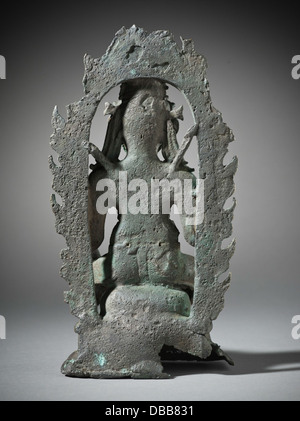 Cette sculpture représente Agni, le Dieu hindou du feu. La figure est coulée en bronze, représentant la divinité avec des attributs associés au feu et à la purification dans la mythologie hindoue. Banque D'Images